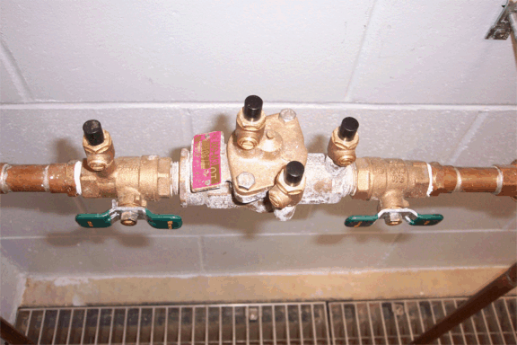 What is a backflow device?